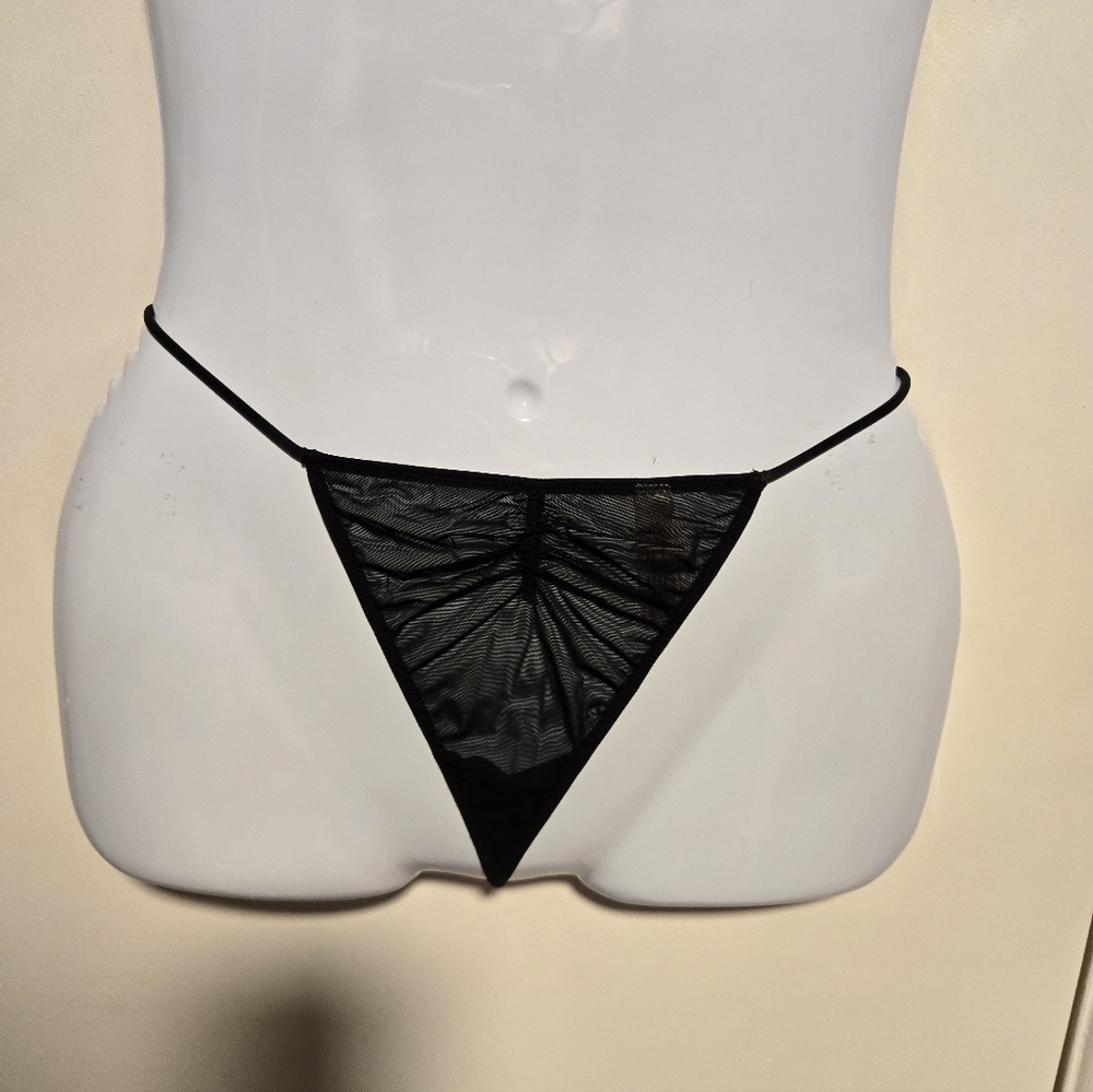 Victoria's Secret Black Mesh Thong with bow and jewel in back. NWOT, SZ M